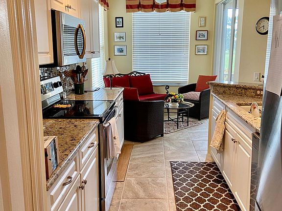 Kitchen looking to adjacent seating