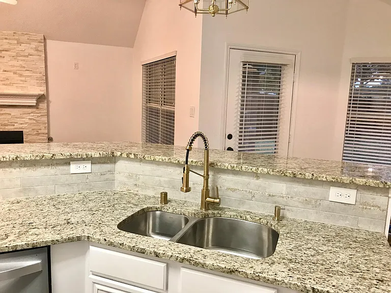 Kraus kitchen sind and faucet
