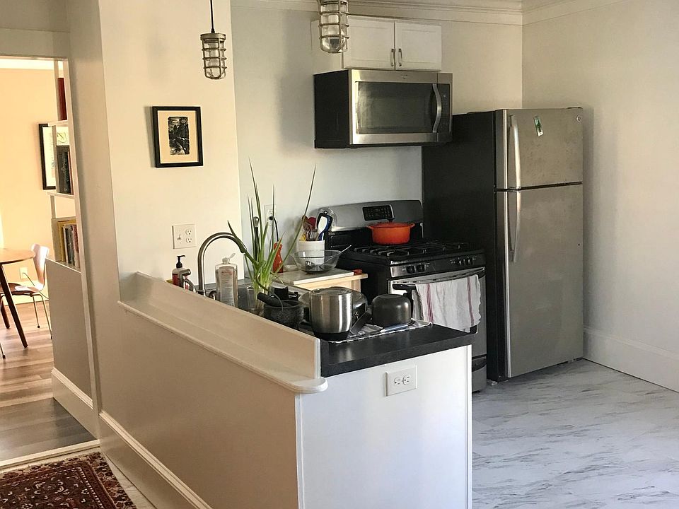 Kitchen with stainless steel appliances and gas stove