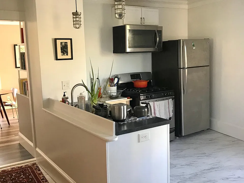 Kitchen with stainless steel appliances and gas stove