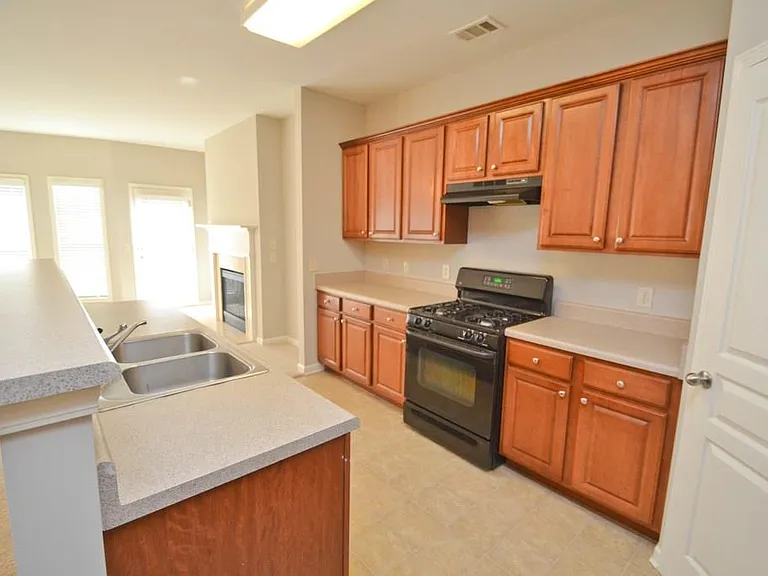 Large Spacious Kitchen with lots of Cabinets and large pantr