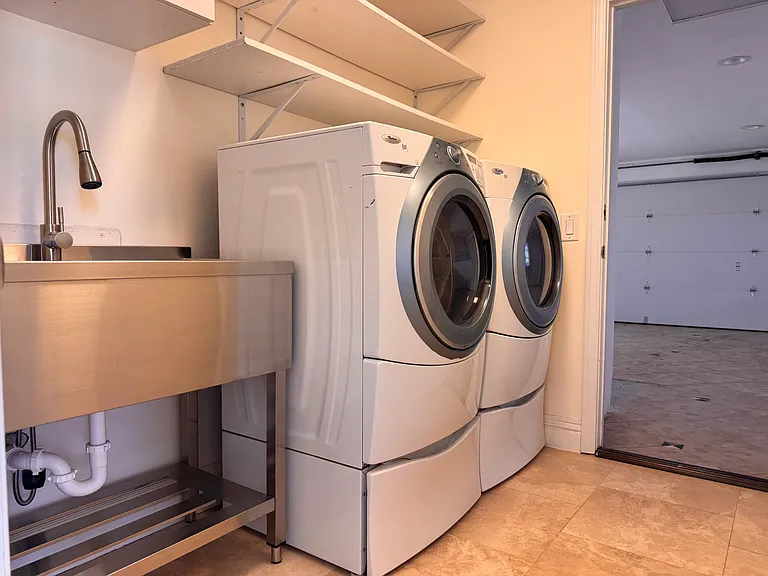 Laundry room located off the 2-car garage.