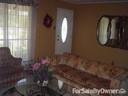 Living room area
						:
						Steel Door with Beveled Glass