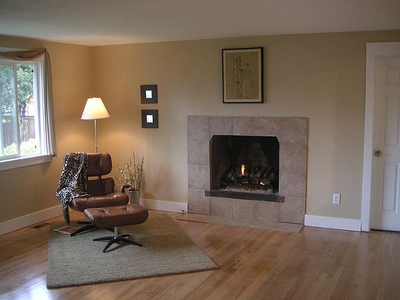Gas logs, oak hardwoods and fresh trim, doors, windows & paint