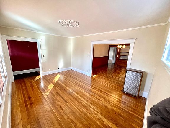 Living room with new windows that bring on the sun and piano window