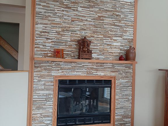 Gas FP in stone & oak trim. 