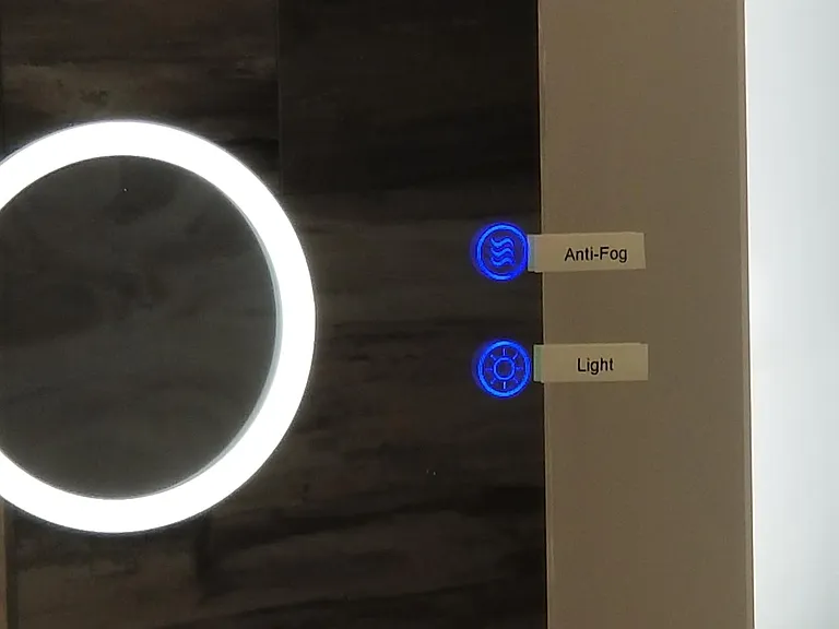 Bathroom mirror has adjustable lights and anti-fog heater.
