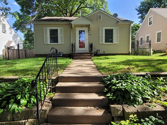 North Side - landscaped with Hostas and two large oak trees