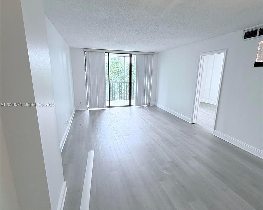 1st image of 3301 N Country Club Dr APT 407