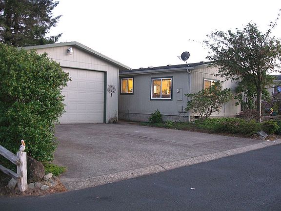 2nd image of 618 NE 58th Ct