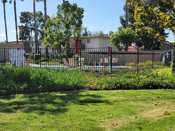 Beauty surrounds the pool and sun deck at Plaza Verde Apartments in Escondido, California.