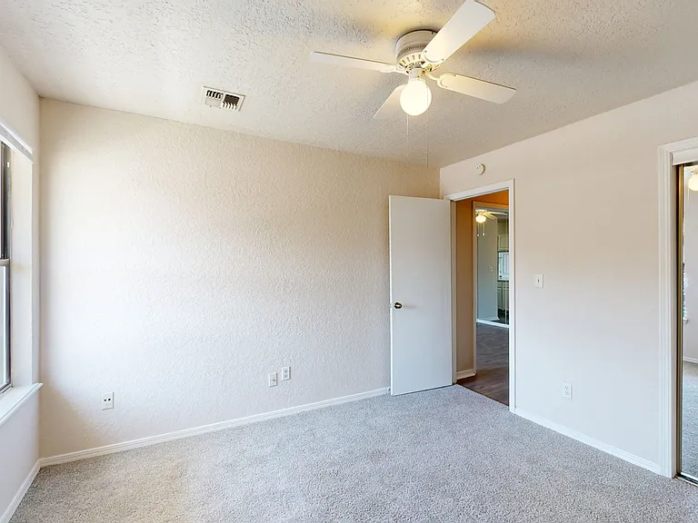 Enjoy comfort and convenience in this airy bedroom with ample storage. Enjoy comfort and convenience in this airy bedroom with ample storage.
