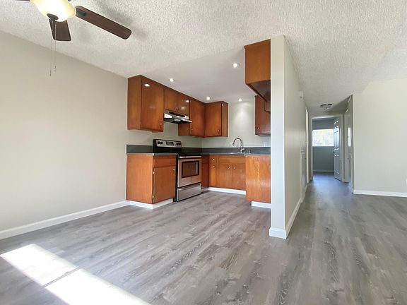 Once you enter, you are meet with a spacious open-floor concept