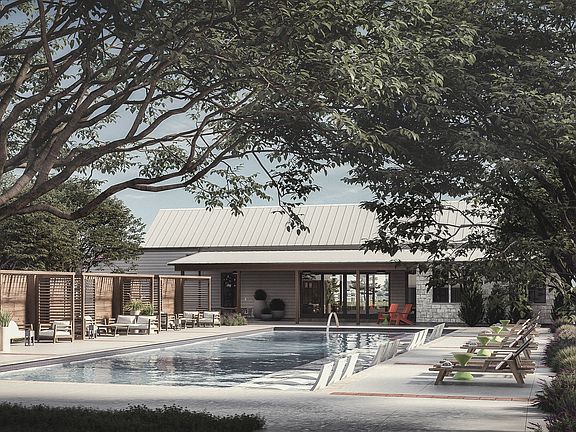 swimming pool with ample seating and chairs