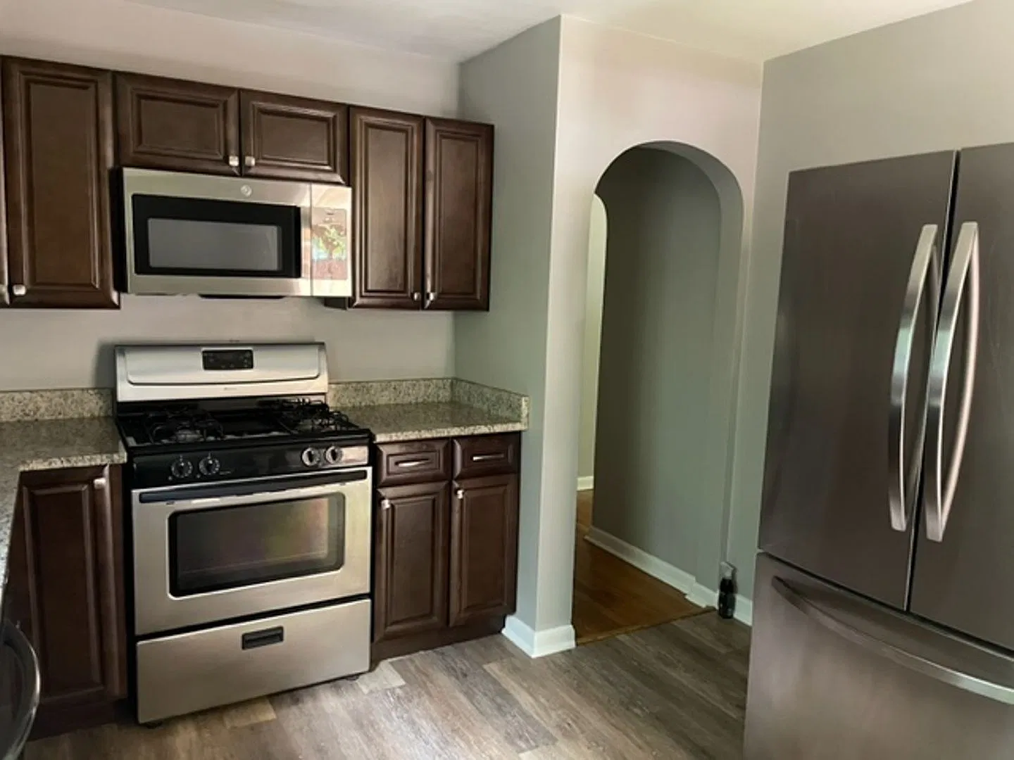 Cozy 2-Bedroom Home with AC, Garage, and Fenced Backyard! — Photo 3