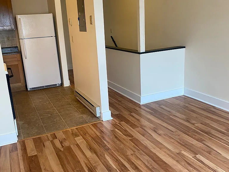 Living Room, Kitchen, and stairs to Bedroom