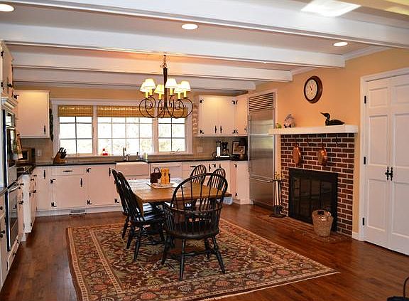 Large country kitchen with cozy fireplace!