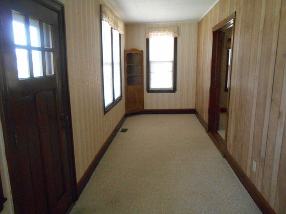 3rd image of 114 E 1st St