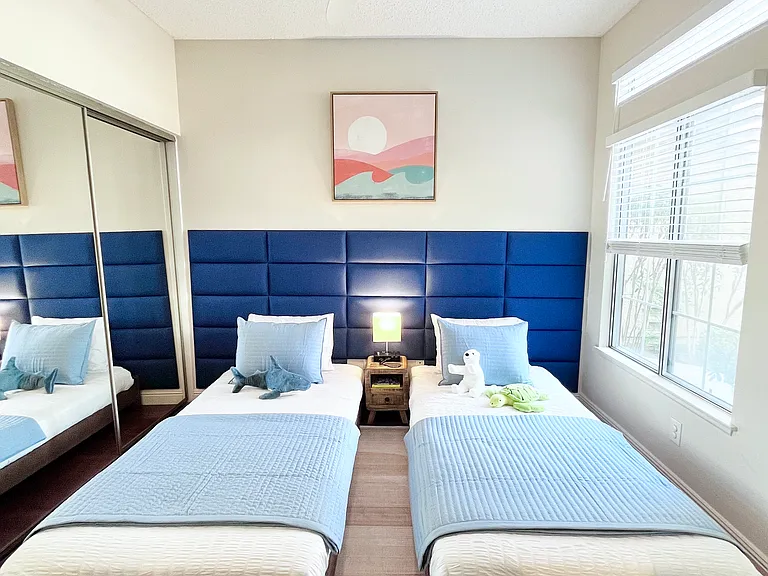 Twin beds or king bed, private attached bathroom, full-length mirrored closet, perfect for kids or additional guests.