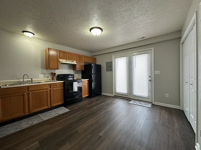 (3-Bedroom 1.5 Bath Unit) - Freshly painted and new plank flooring.
