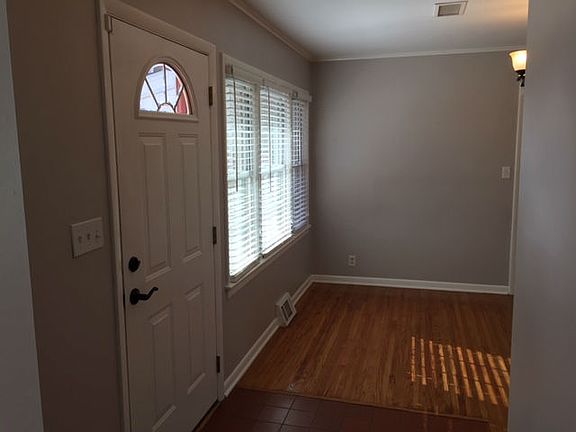 Front door and dining room