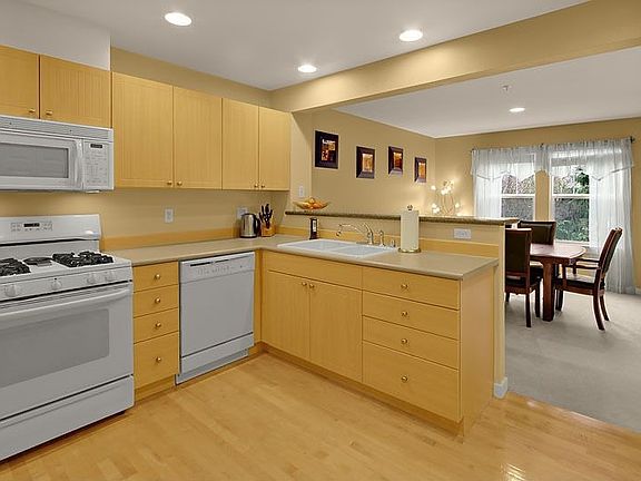 Kitchen & Dining room in the background