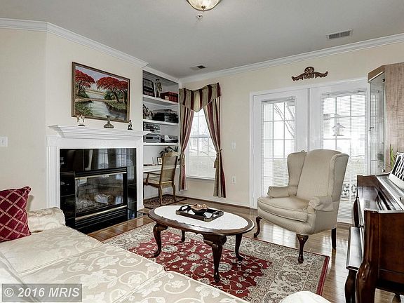 Living Room with Fireplace and Built In Bookcase