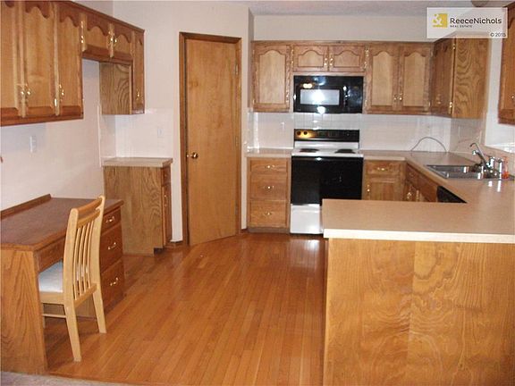 KITCHEN WITH HARDWOOD FLOORS