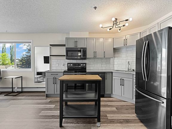 5th image of 2305 35a Ave NW Unit 214
