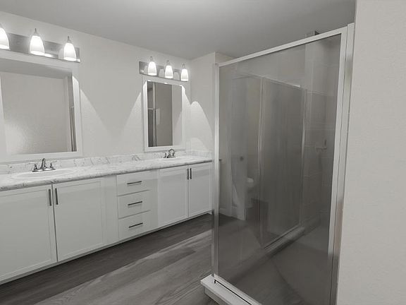 Your suite is complete with a private en-suite bath Artist s rendering