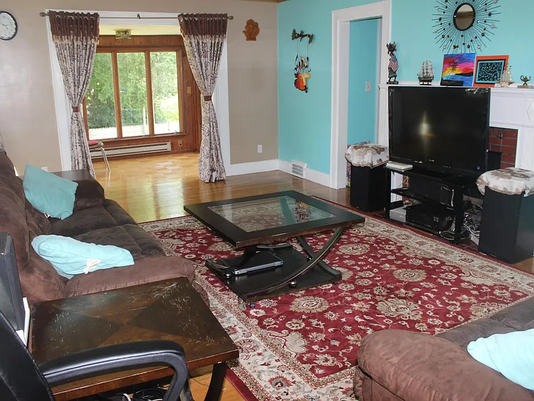 Living room (blue wall is repainted with the matching color with the rest other wall color)