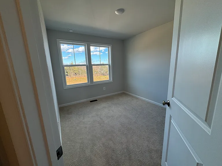 Upstairs bedroom#3. Large windows