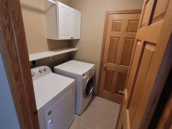 First floor laundry room & storage closet