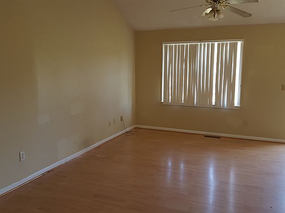 Large living, dining room vaulted ceiling