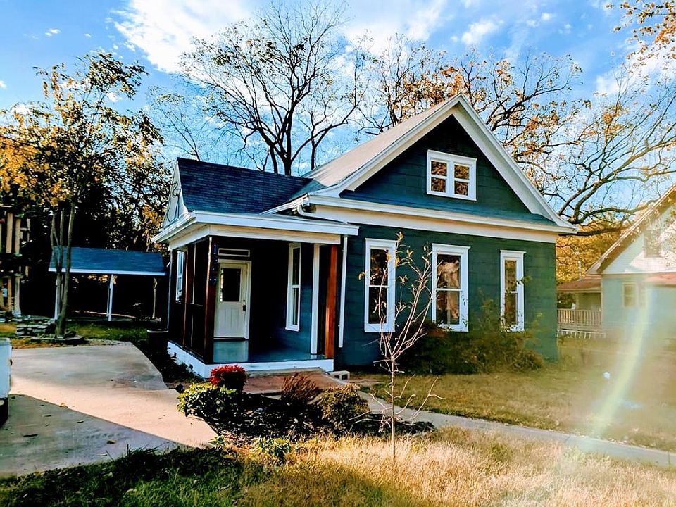 Freshly painted with an open porch ready for your lounge cha