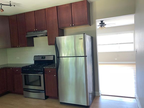 Kitchen 15' x 12' - Gas Stove, Dishwasher, Microwave, and Garbage Disposal.