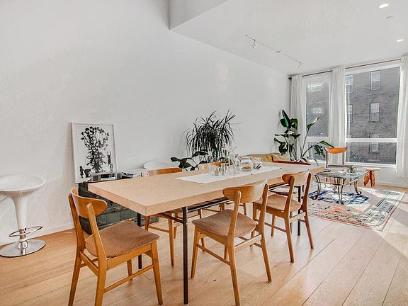 Dining area has open 18' ceilings