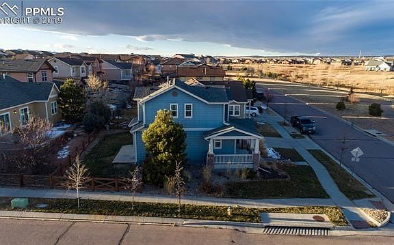 Side aerial view of home on corner lot