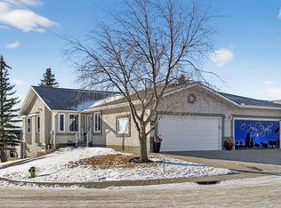 206 NE Arbour Cliff Close NW, Calgary, AB T3G 3W7