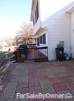 Back-Side View,
						:
						of the added Patio and deck