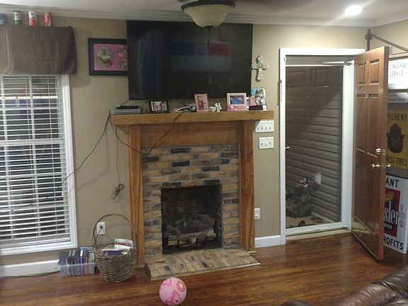 Brick fireplace w/gas logs