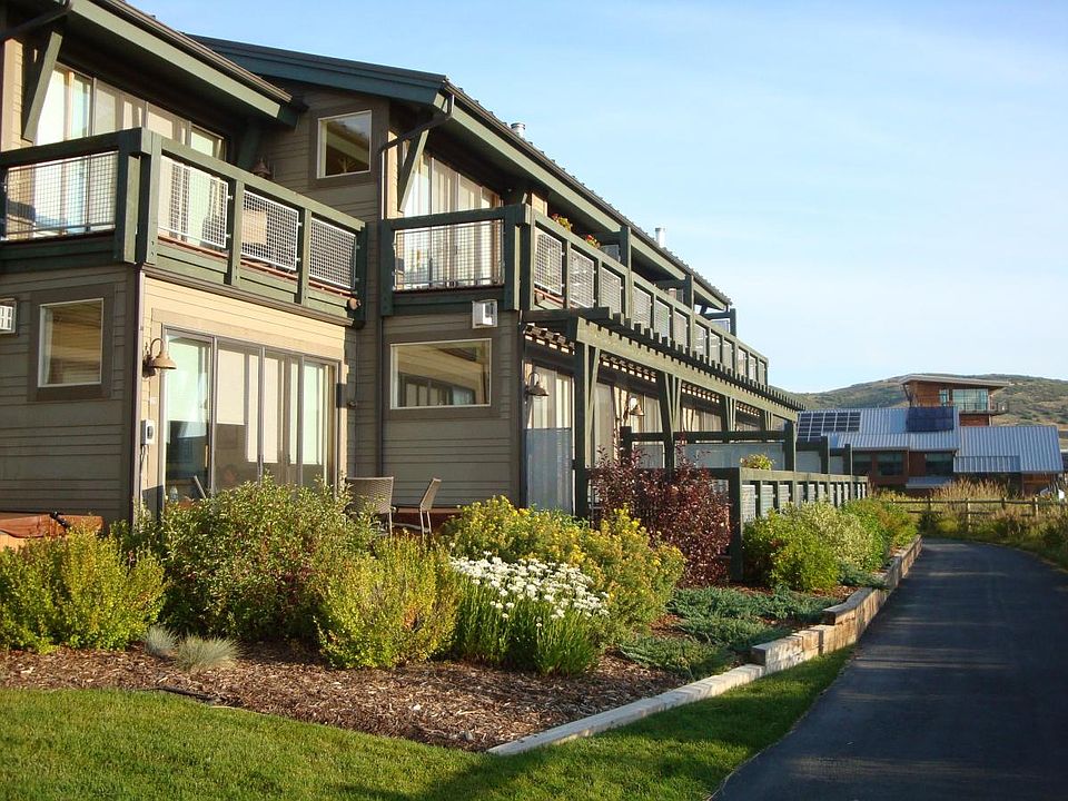 Corner unit with 2 enclosed decks; you're right on the bike
