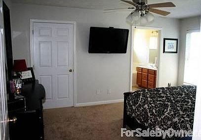 Master bedroom with walk-in closet
