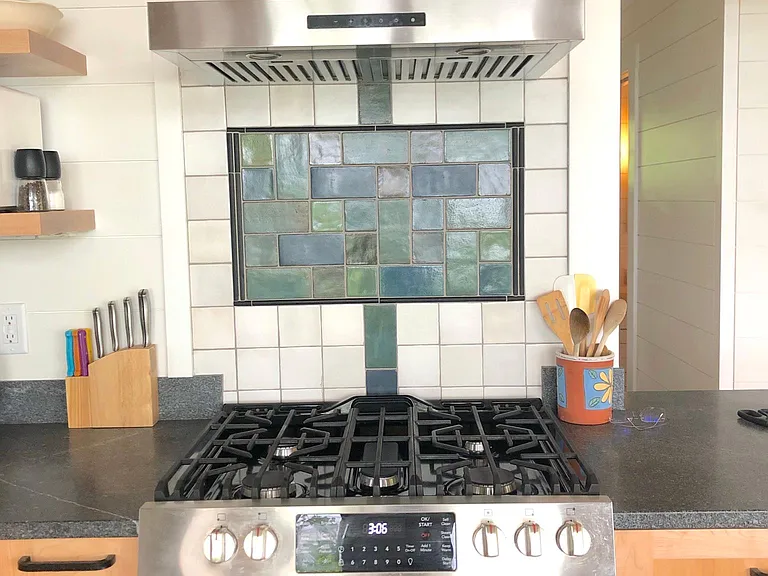 Gas range with hood