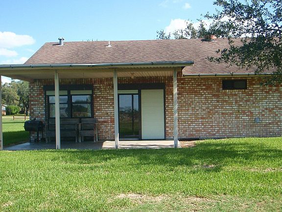 Back door (needs hummingbird feeders back up)