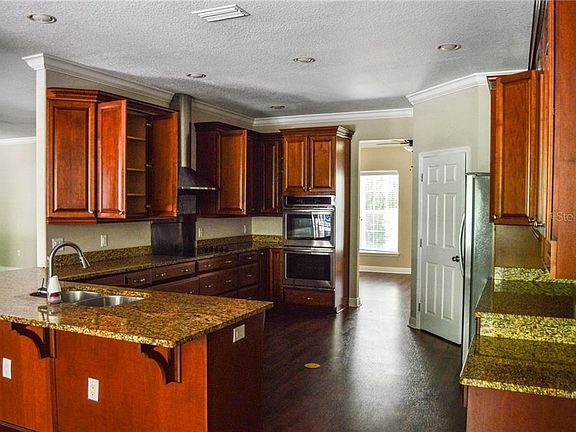 5th image of 9750 S Magnolia Ave