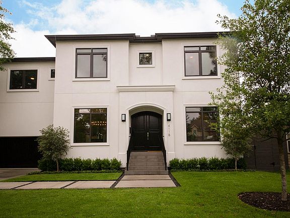 Features include high ceilings, crown molding, Restoration Hardware light fixtures, casement windows
