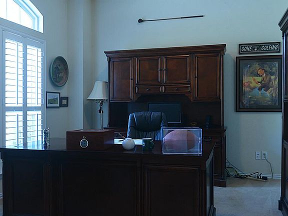 Across the entry from the dining room is the study which offers plenty of space for your desks and b