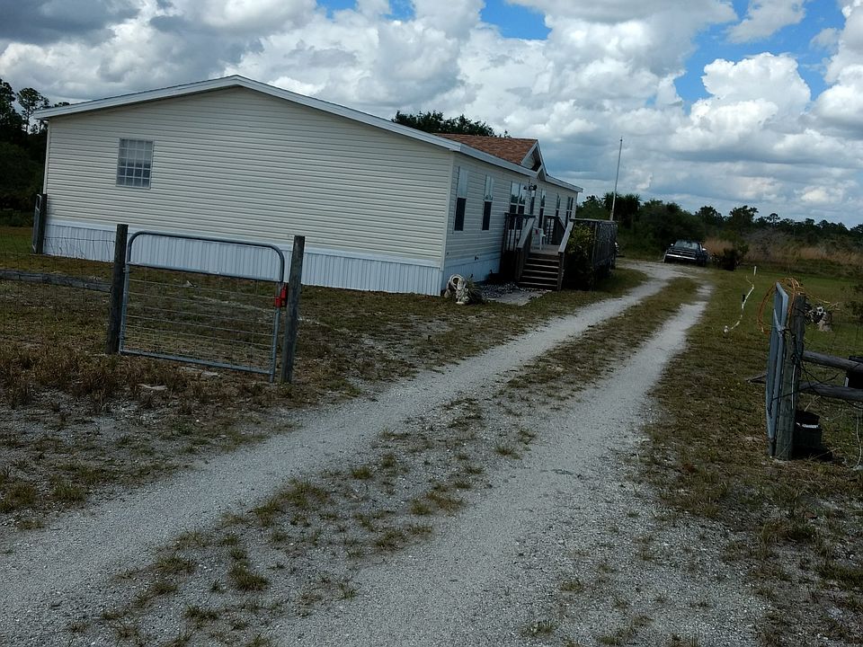 Looking at house up driveway