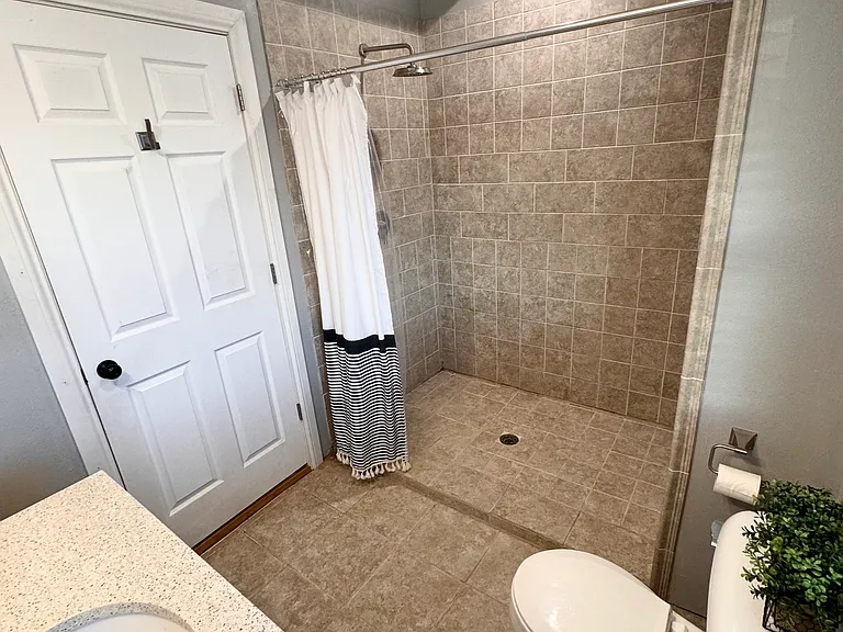 walk in tiled Shower in Bedroom